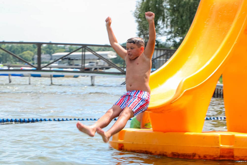 Grace Adventures - 2025 Summer Camp - Kid on Water Slide