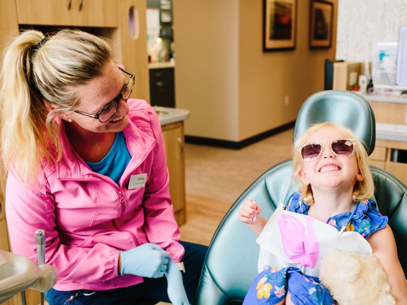 Pediatric Dental Specialists of West Michigan smiling girl in dental chair