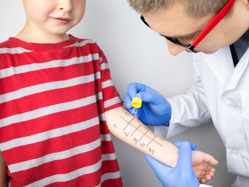 Allergist testing kid arm 