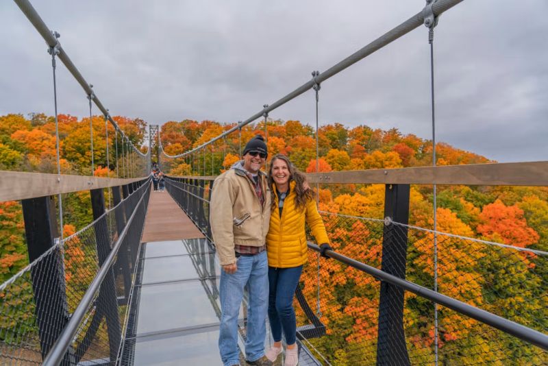 SkyBridge Michigan couple on bridge in fall