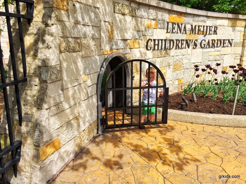 Lena Meijer Children's Garden young boy at gate entrance