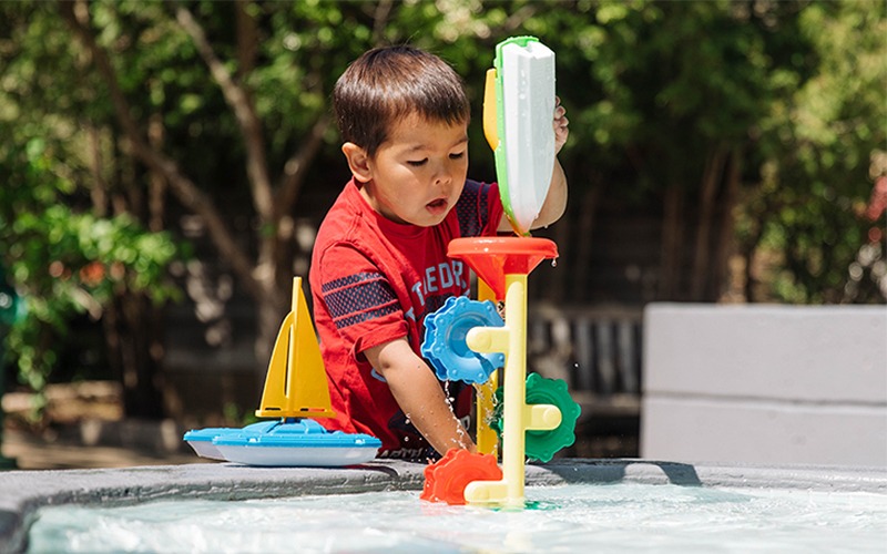 Meijer Gardens child at water table childrens garden