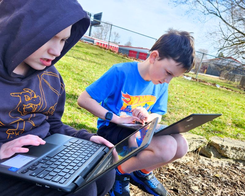AnchorPoint christian school boys on chromebooks outside