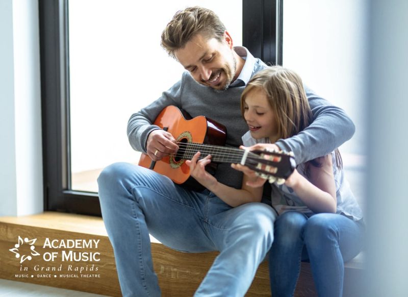 Academy-of-Music-father-and-daughter-playing-guita