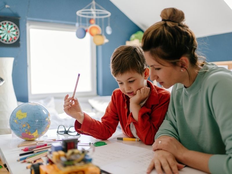 Homeschooling Boy And Mother With Planets Canva AleksandarNakic From Getty Images Signature