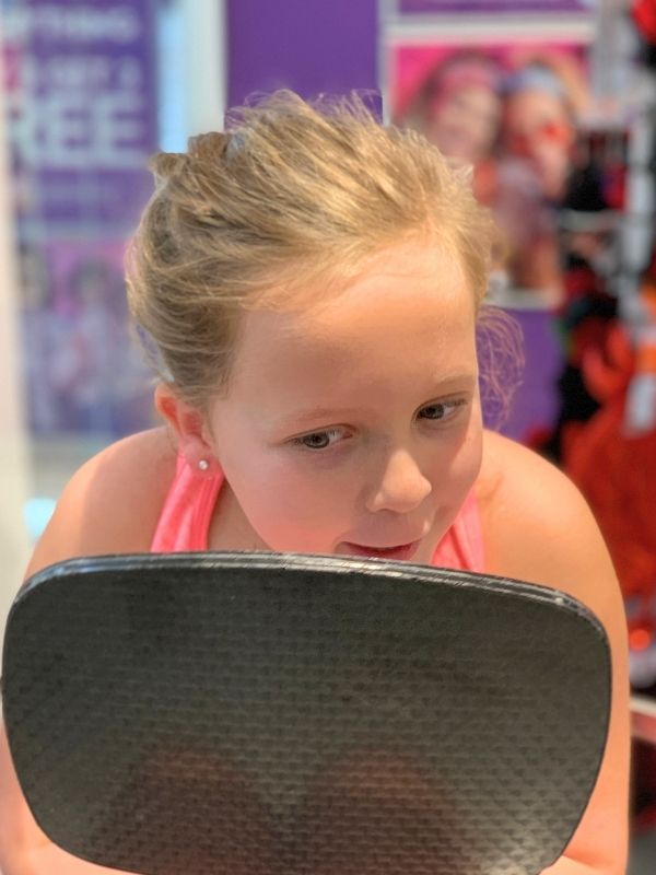 girl gets ears pierced for the first time