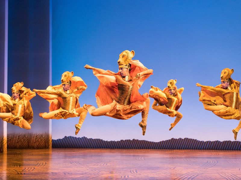 Disneys The Lion King lion dancers jumping