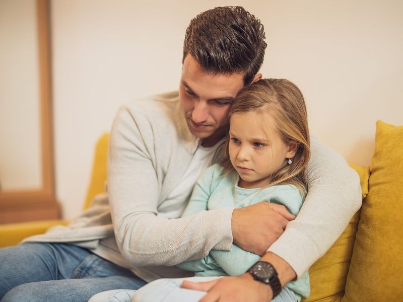foster care dad comforting angry girl 