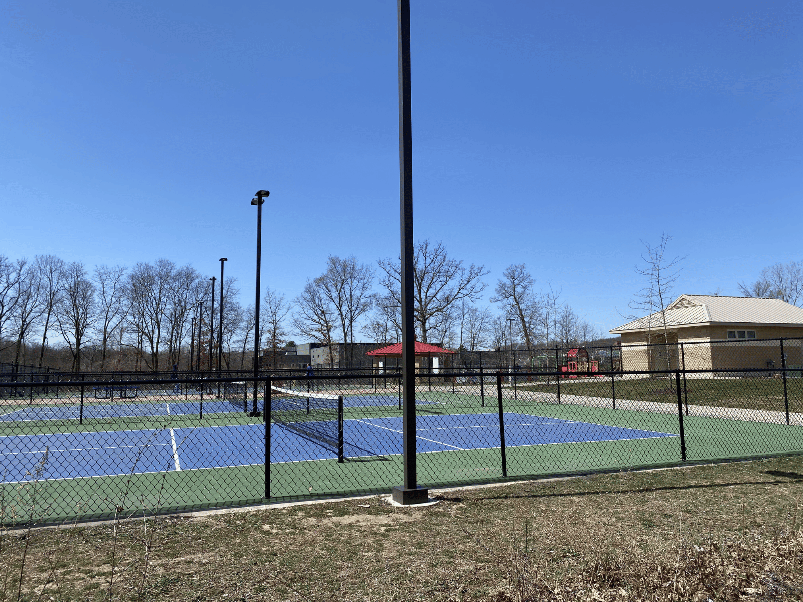Courts at Lowell Grand River Riverfront Park Bridge